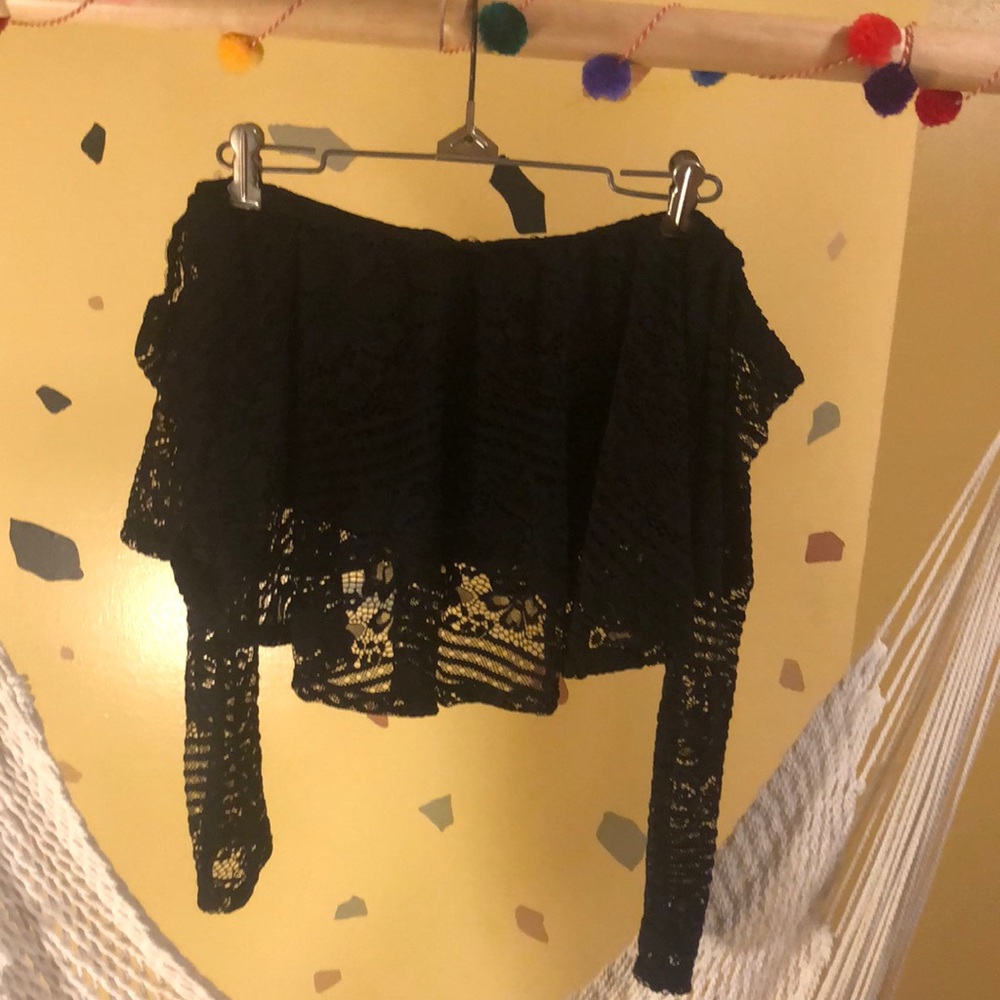 Black lace crop top with a sheer layer under the lace